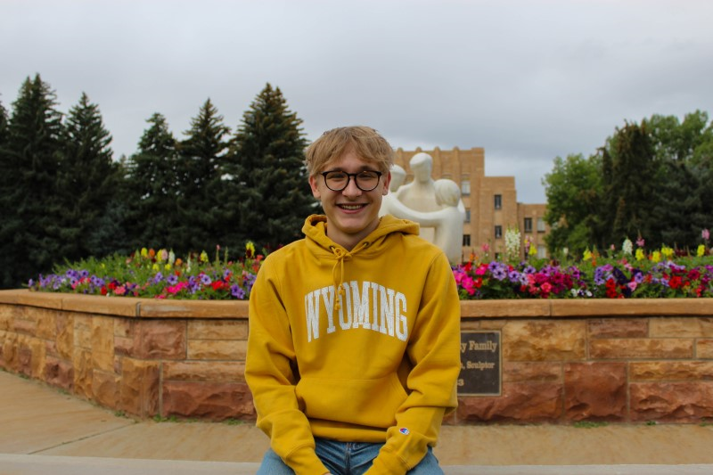 Champion Distressed Wyoming Arch Reversed Weave Hoodie University Store
